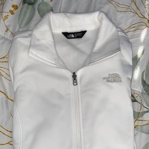 The North Face white jacket w/ two front pockets that zip (new)